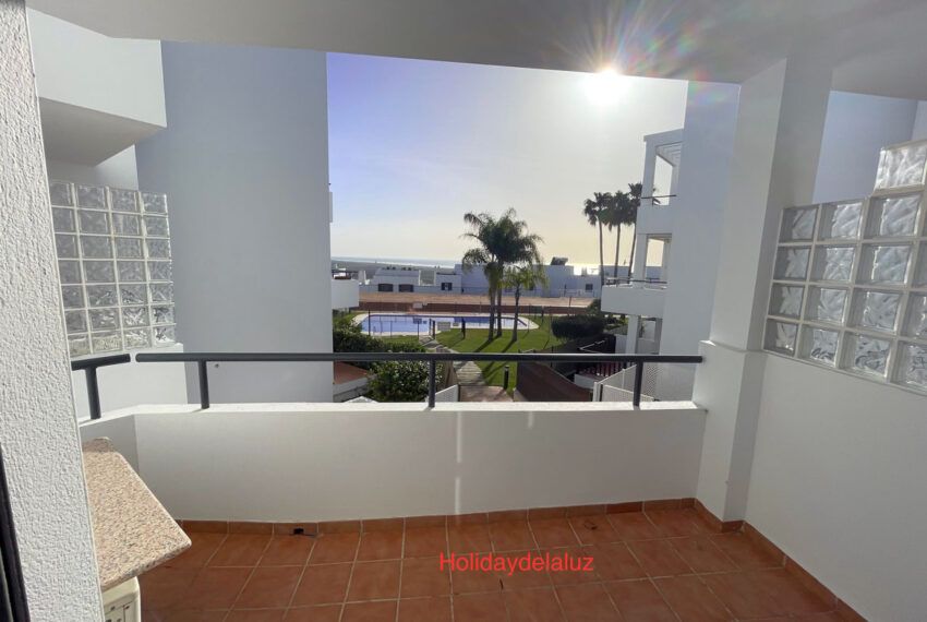 Apartment Miguel - apartment in Conil de la Frontera for rent - Holidaydelaluz - Balcony overlooking the community pool + Atlantic Ocean