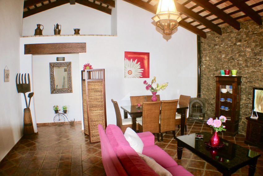 Casa Roció - Holiday home in Roche Viejo for rent - fireplace - corridor to the bedrooms